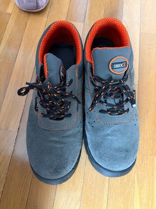 Zapatillas de trabajo Oriocx grises y naranjas