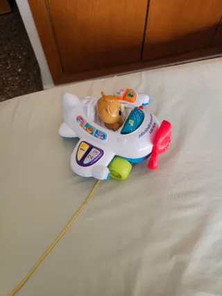 Avión de arrastre infantil con piloto