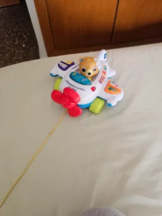 Avión de arrastre infantil con piloto