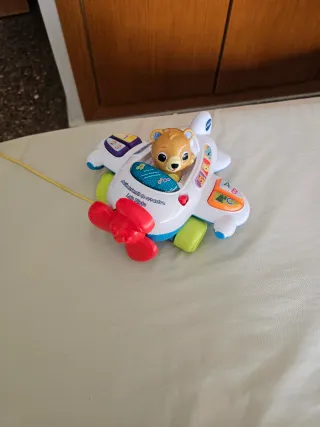 Avión de arrastre infantil con piloto