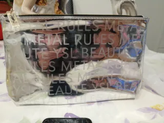 Necessaire Yves Saint Laurent argentato