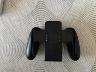 Nintendo Switch OLED + Super Mario Bros Wonder.