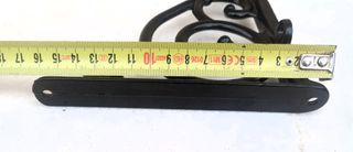 2 Soportes metálicos.