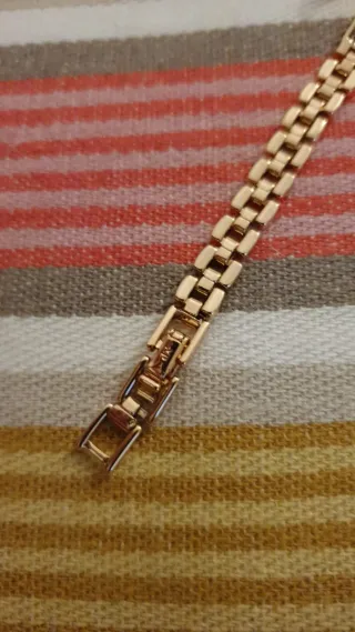 Pulsera chapada en oro con caja