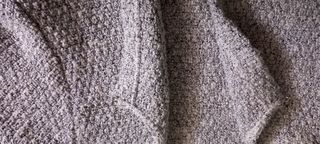 Chaqueta punto gris con brillos