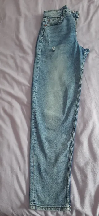 Vaqueros azules desgastados