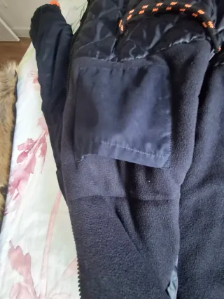 Parka Superdry azul con detalles naranja