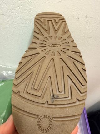 Stivali UGG alti verdi con design floreale