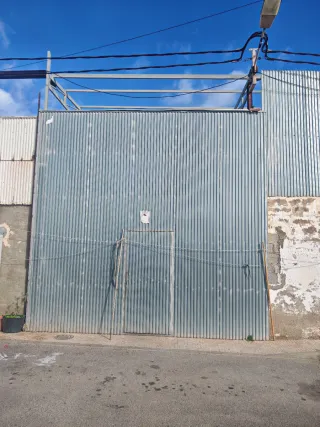 Puerta corredera metálica industrial