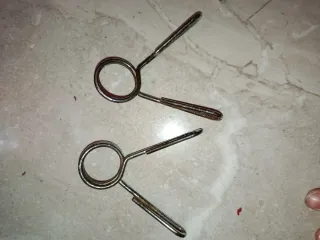 Abrazaderas para pesas y mancuernas