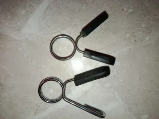 Abrazaderas para pesas y mancuernas