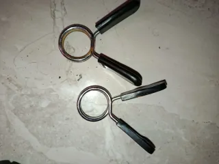 Abrazaderas para pesas y mancuernas