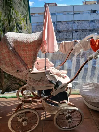 Carro de bebé de tweed rosa