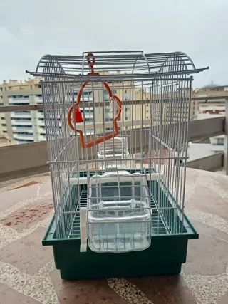 Jaula para pájaros nueva con accesorios