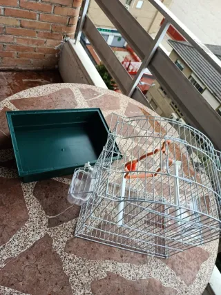 Jaula para pájaros nueva con accesorios