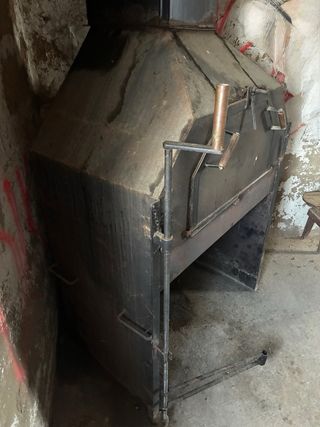 Chimenea de hierro con horno