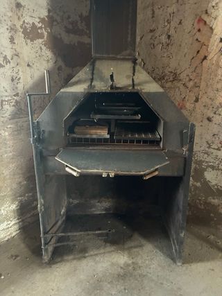 Chimenea de hierro con horno