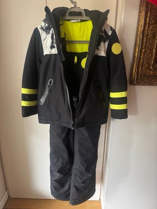 Tuta sci Diesel nera e gialla  8 anni