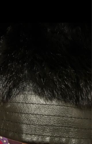 Cazadora piel conejo con bolso y monedero a juego