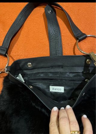 Cazadora piel conejo con bolso y monedero a juego