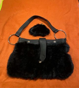 Cazadora piel conejo con bolso y monedero a juego