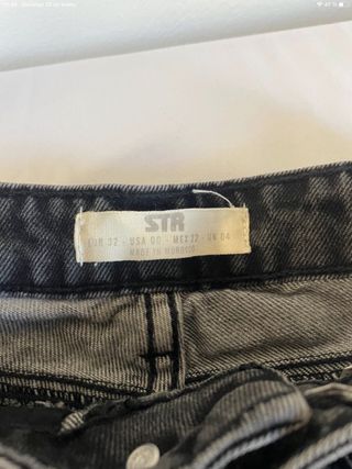Pantalón vaquero recto gris y negro Stradivarius