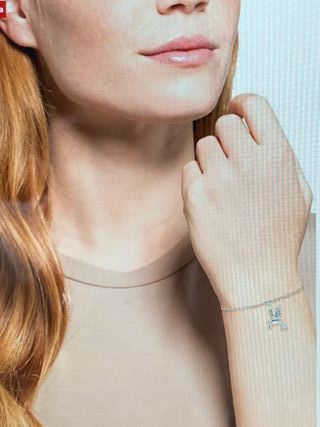 Pulsera de plata con colgante de pájar AMOR