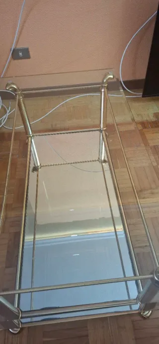 Mesa vintage de centro de salon de cristal y metal