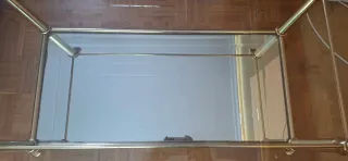 Mesa vintage de centro de salon de cristal y metal