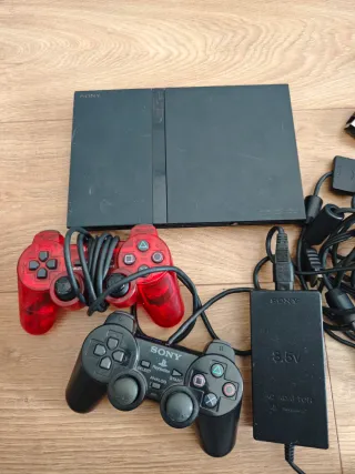 PlayStation 2 + 2 mandos (negro/rojo)