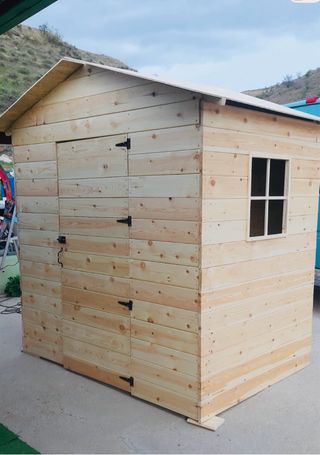 Casa de madera para jardín