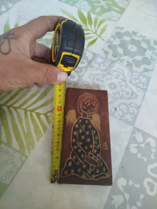 Cuadro antiguo de ángel con estrellas