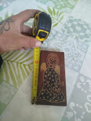 Cuadro antiguo de ángel con estrellas