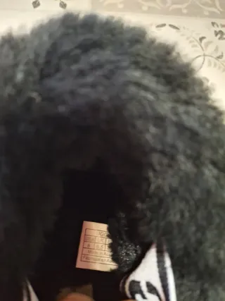 Ciabatte UGG nere con fodera in pelliccia. N39.