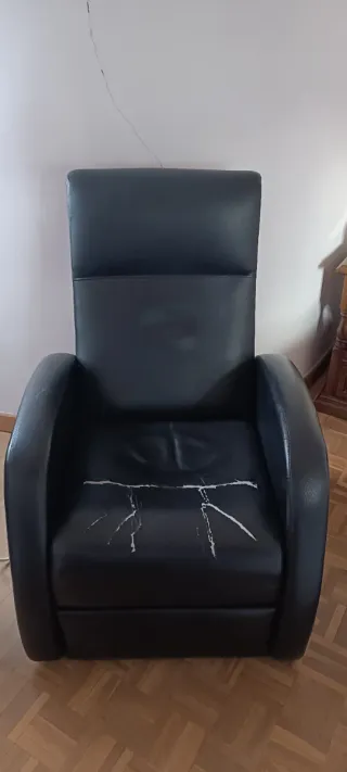 Sillón reclinable de piel negro