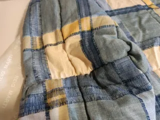 Edredón a cuadros azul y amarillo