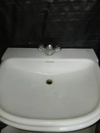 Lavabo de porcelana blanco