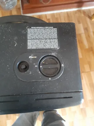 Calentador de gas negro