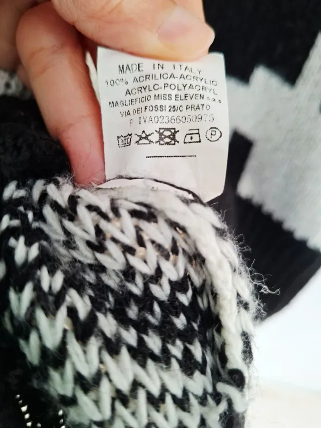 Jersey de punto mujer, oversize, con cuello alto.