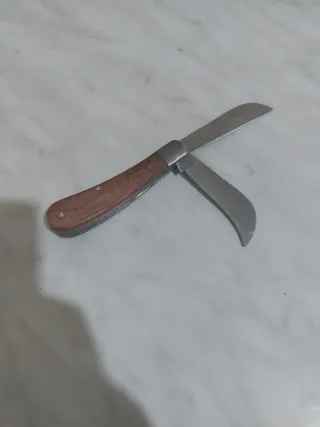 Coltello Stanley con lama seghettata