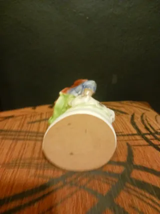 Escultura niño con perro porcelana