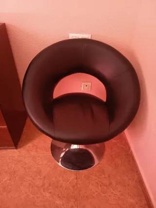 Butaca elevadora negra y plateada