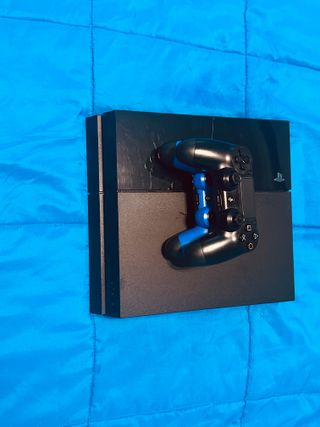 Consola PS4 (PlayStation 4) con mando Negra y Azul