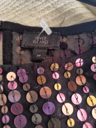 Blusón lentejuelas negro y multicolor