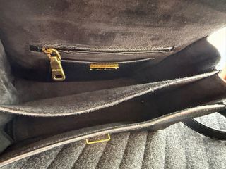 Borsa Miu Miu in pelle nera e dorata