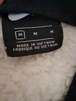 Sudadera polar Nike negra y blanca