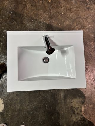 Lavabo de cerámica con mueble