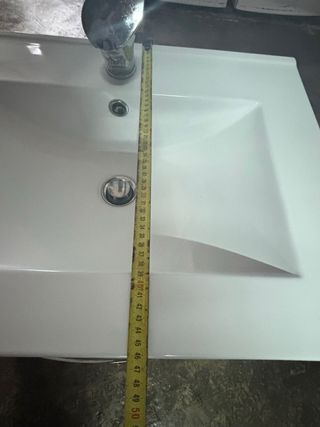 Lavabo de cerámica con mueble