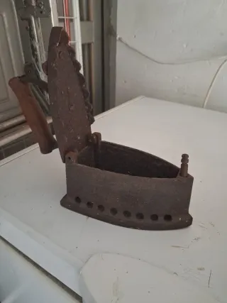 Plancha antigua de carbón