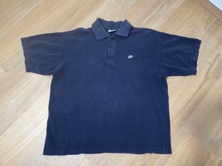 Polo Nike Azul marino con el bordado rosa